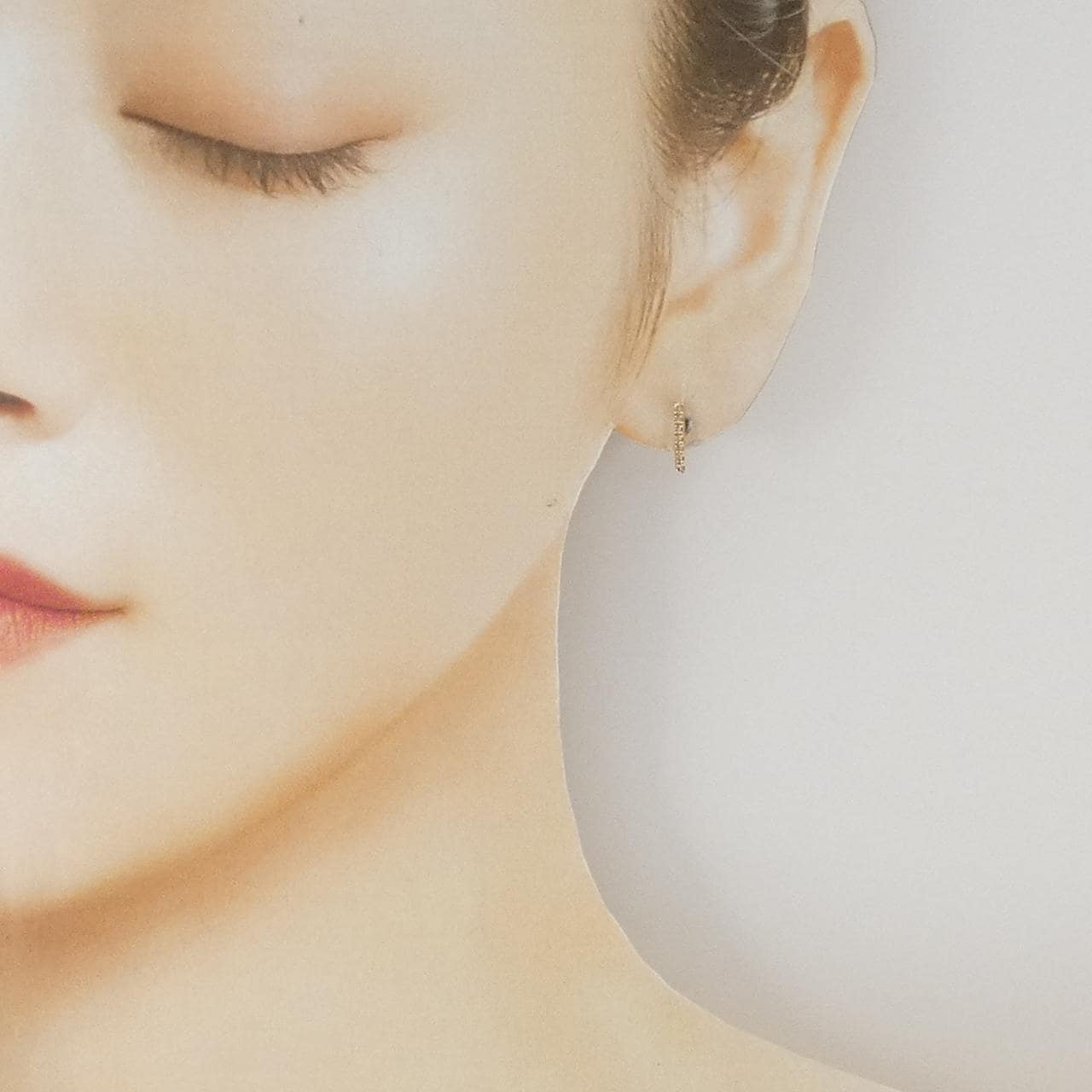 ヒロタカ ステープル ピアス 0.06CT