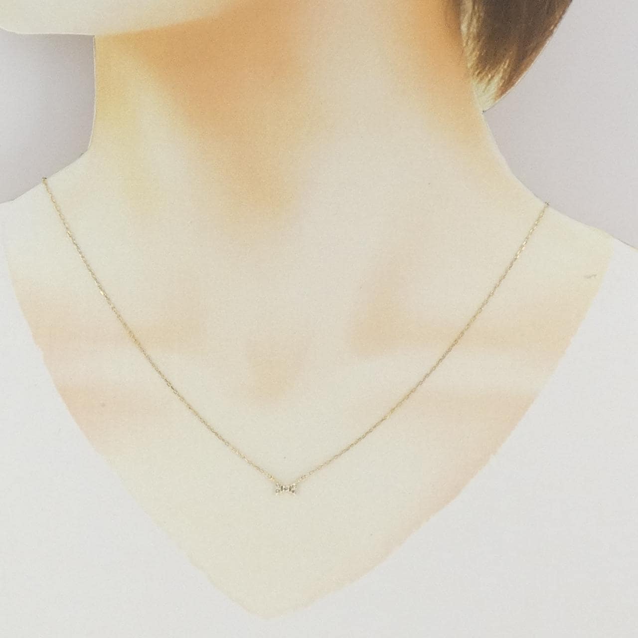 K10YG リボン ダイヤモンド ネックレス 0.06CT