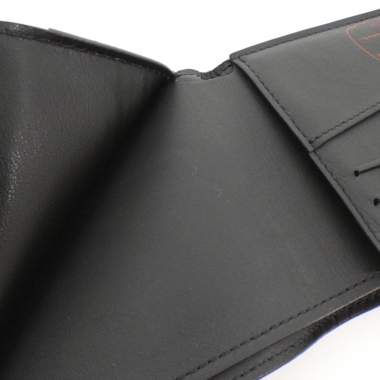LOUIS VUITTON Taurillon (LV x YK) Portefeuille Slender M81902 Billfold