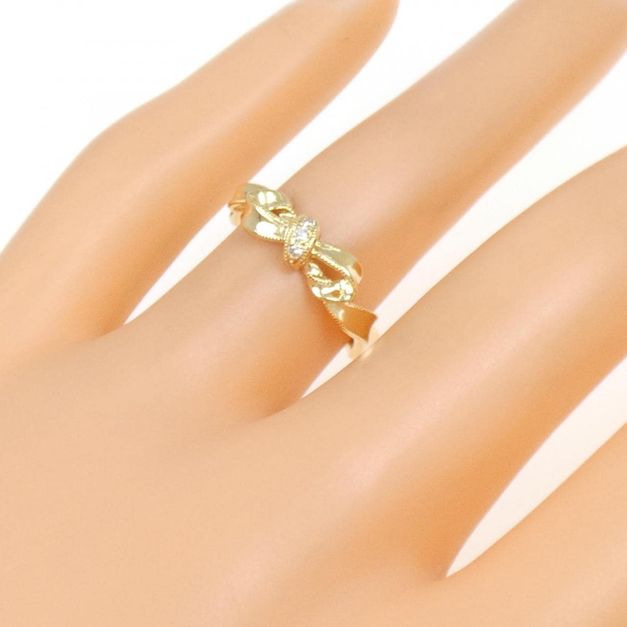 K18YG リボン ダイヤモンド リング 0.03CT