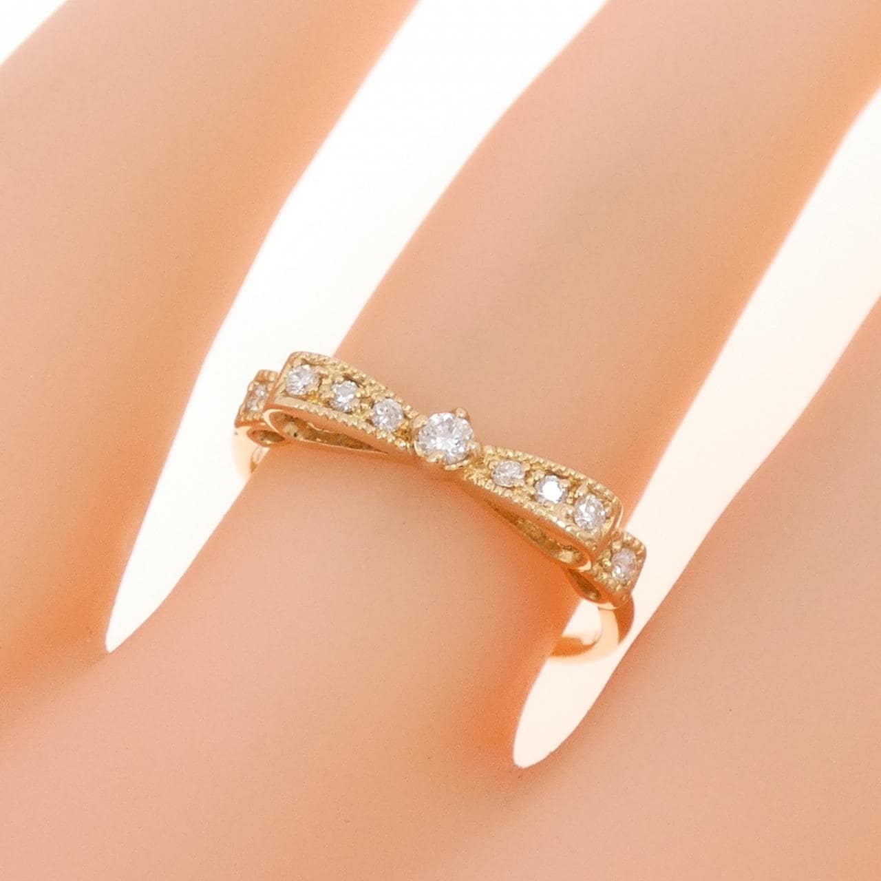 K18PG リボン ダイヤモンド リング 0.10CT