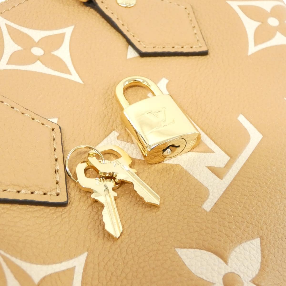 [未使用品] LOUIS VUITTON雙色Monogram Empreinte Speedy Bandouliere 20 公分 M12713 包