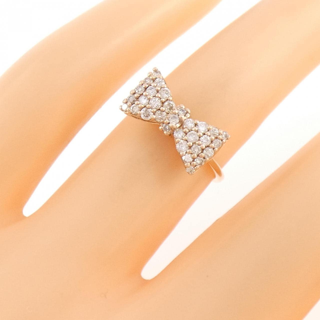 K10PG リボン ダイヤモンド リング 0.30CT