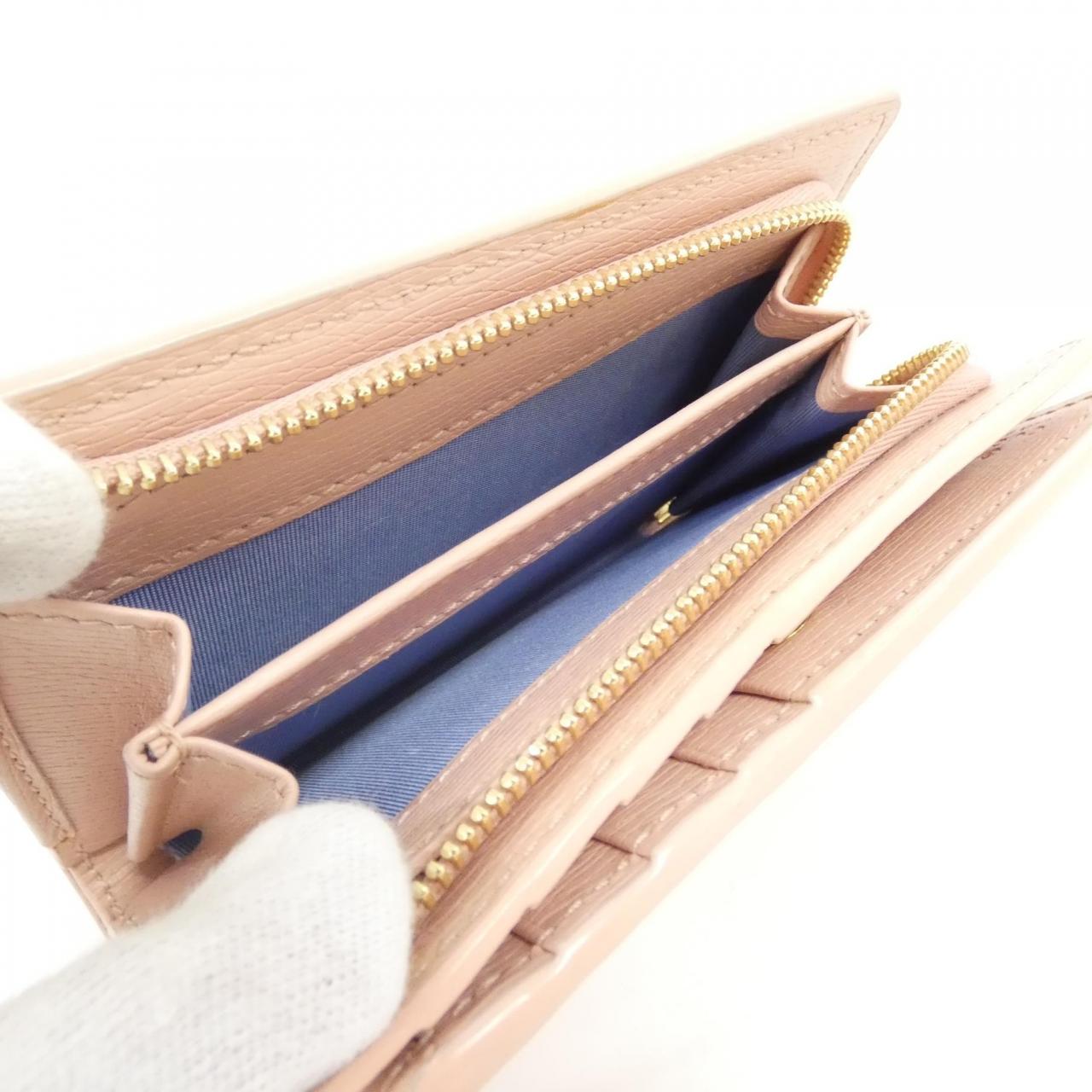 グッチ 772640 0OP0N 財布