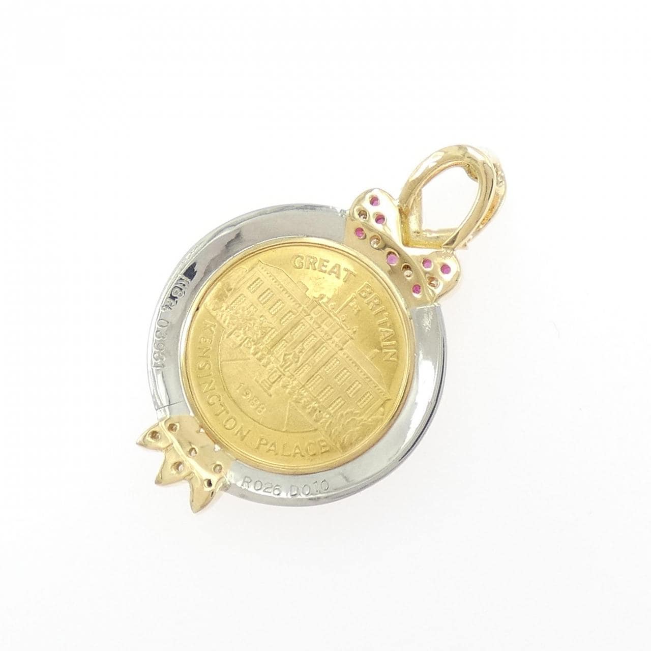 K18YG/PT(枠) ルビー コイン ペンダント 0.26CT
