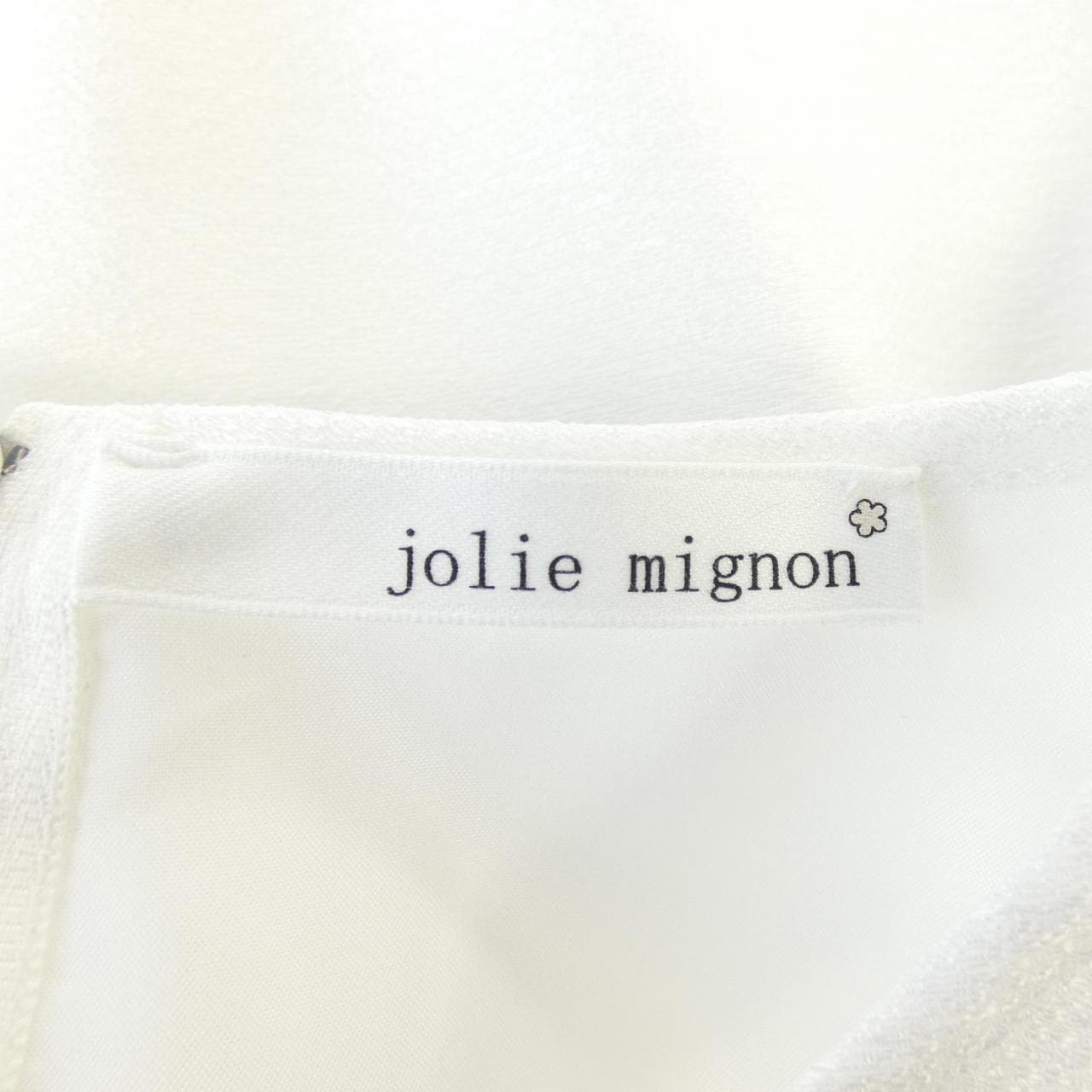 jolie mignon トップス