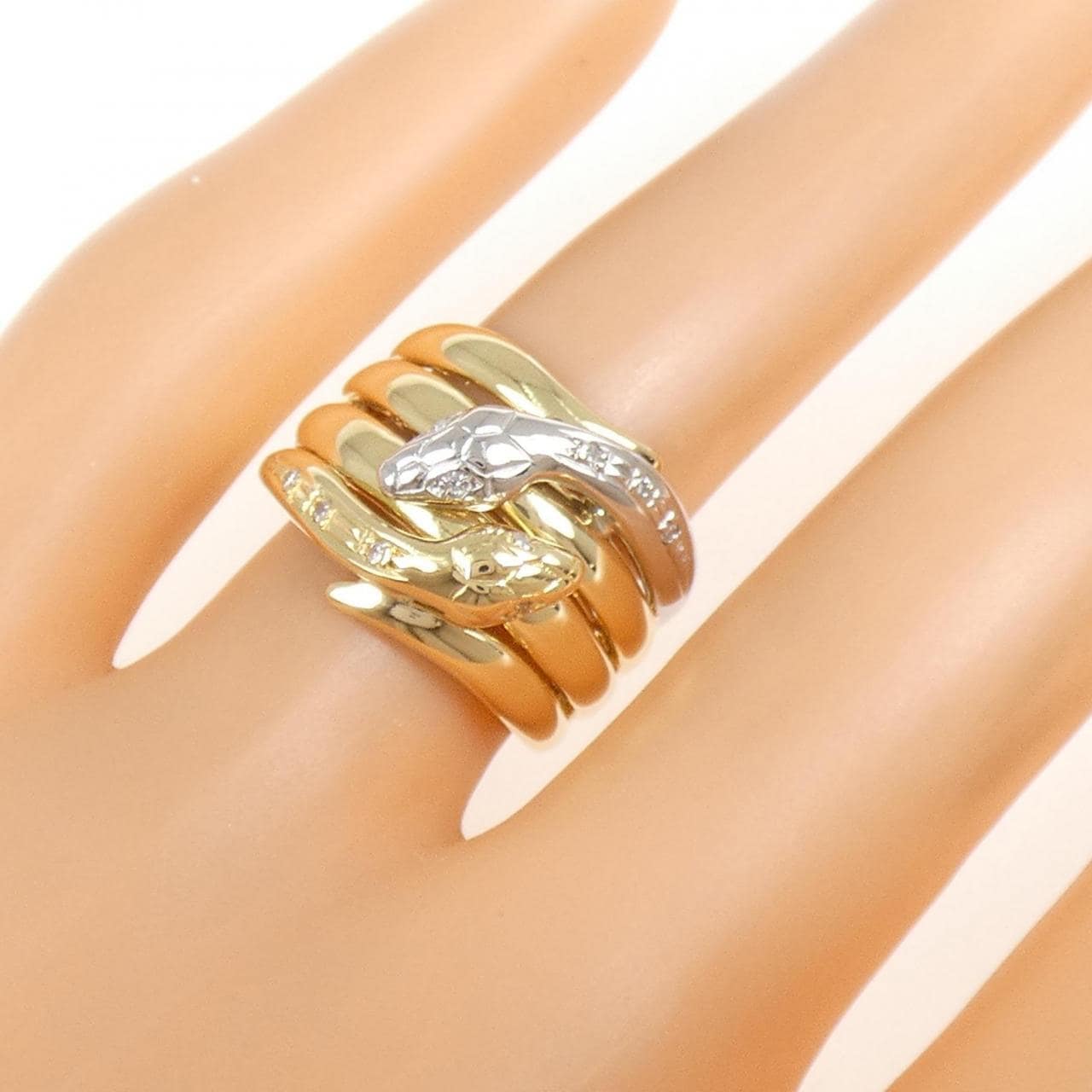 K18YG/PT900 スネーク ダイヤモンド リング 0.06CT
