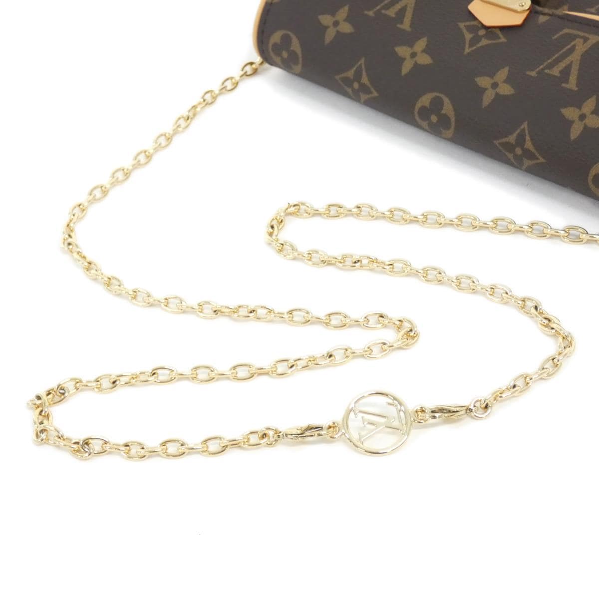 [未使用品] LOUIS VUITTON Monogram Pochette Camille M13566 单肩包