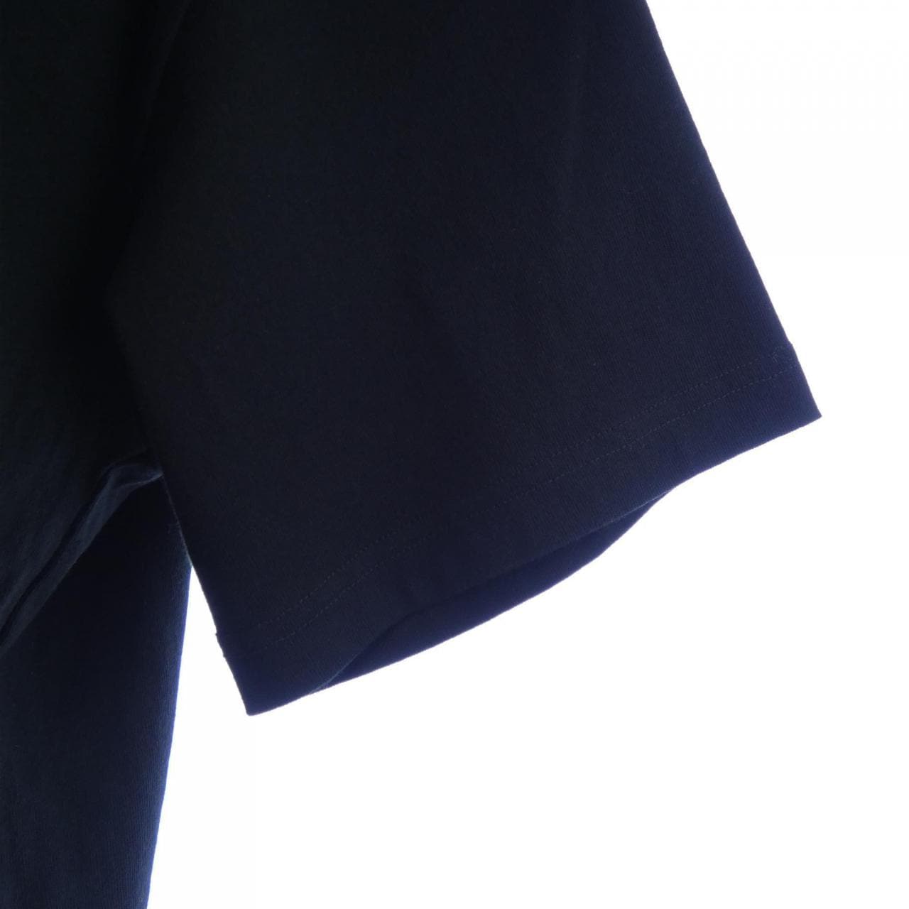 サカイ SACAI KAWS HOLIDAY XX Tシャツ
