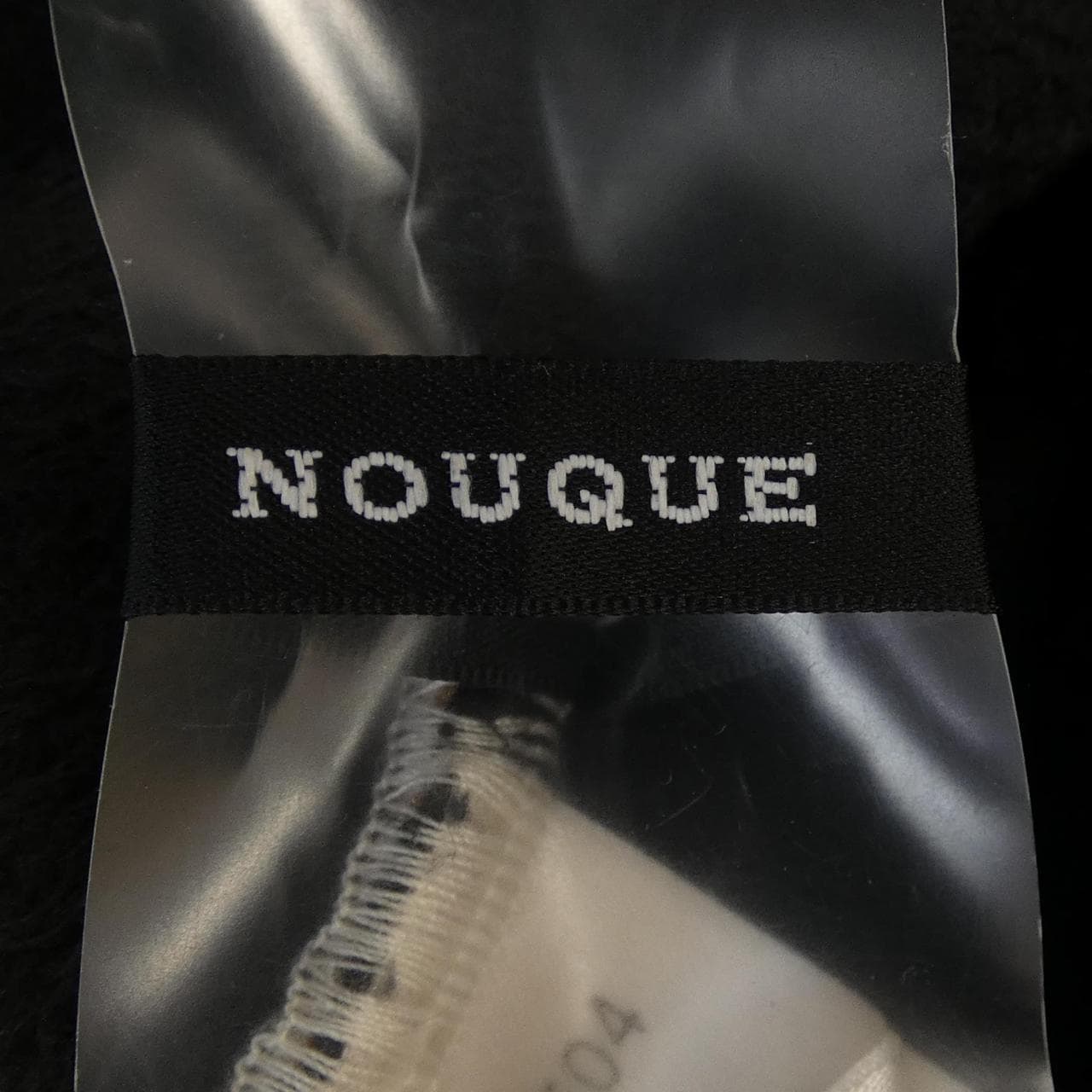 ヌーク NOUQUE コート
