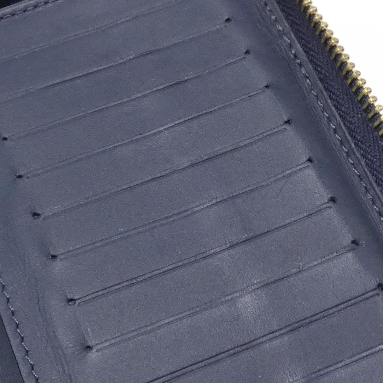 LOUIS VUITTON Monogram Drip拉链钱包竖版M81107 钱包