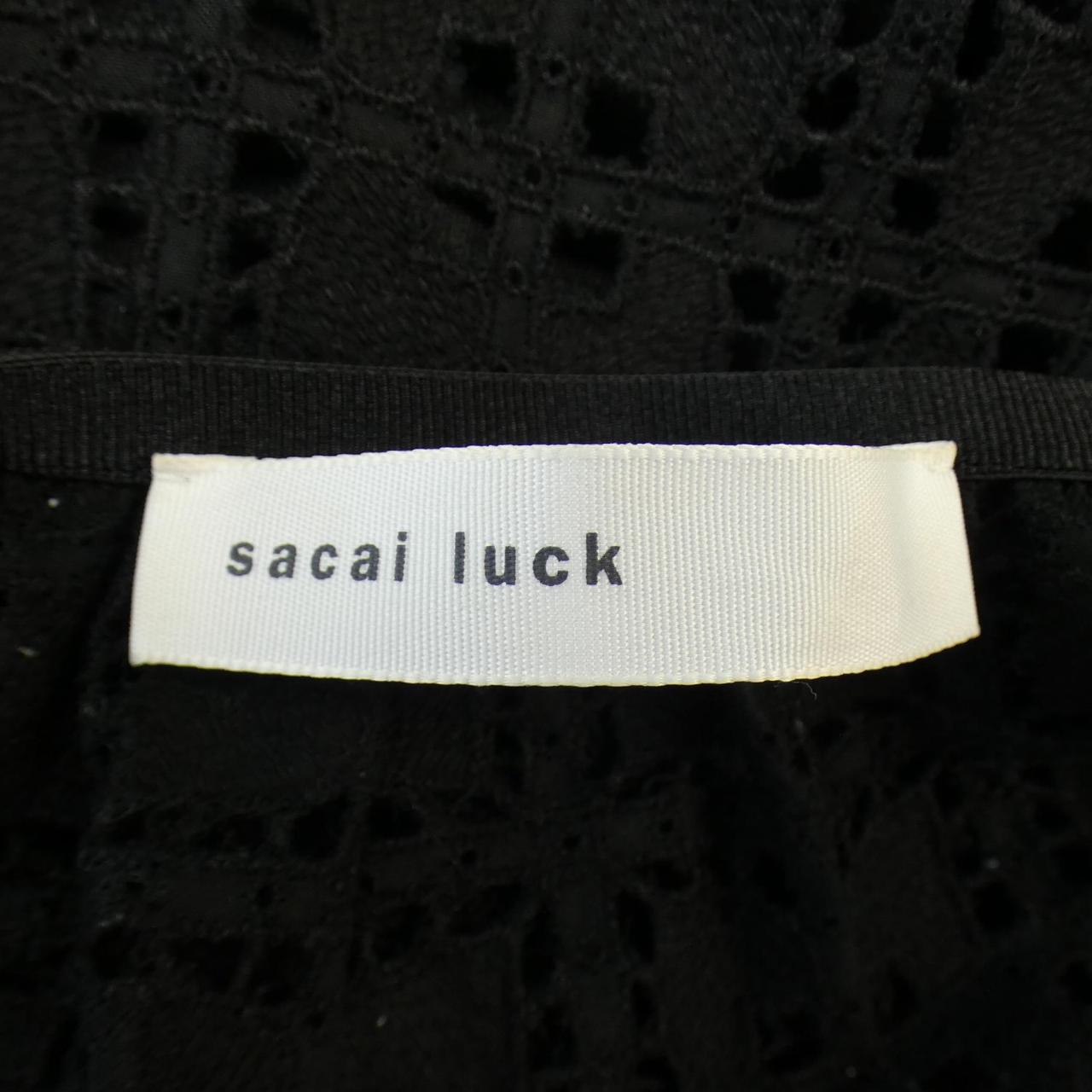 sacai luck tops
