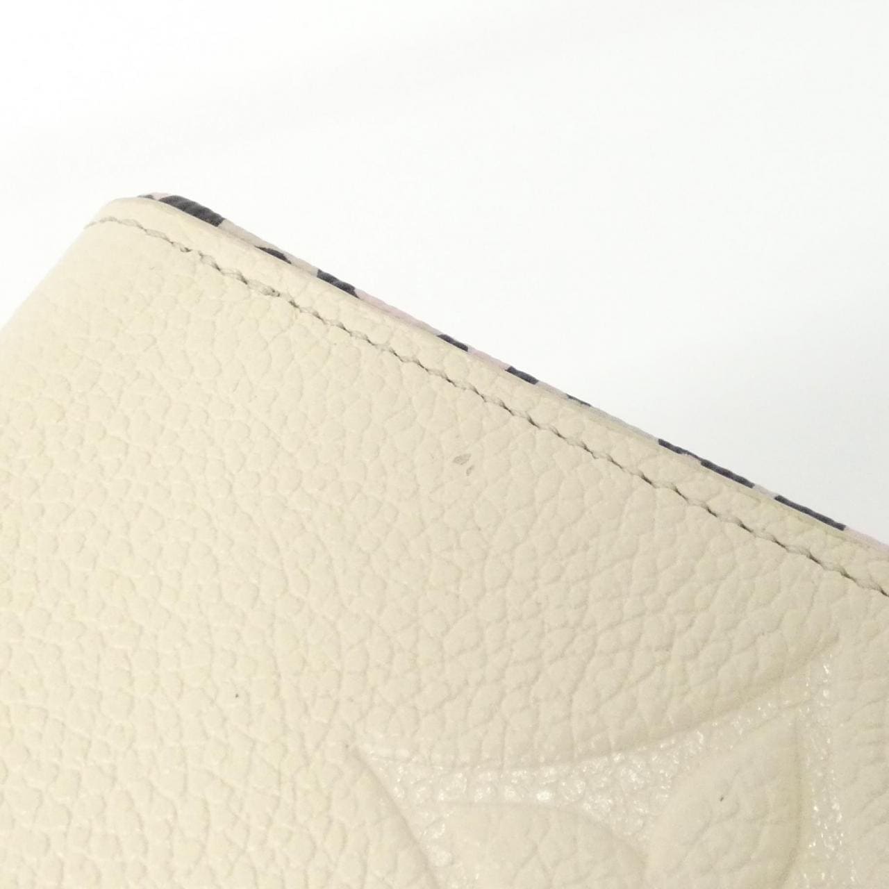 LOUIS VUITTON Monogram Empreinte (Wild at Zippy Wallet M80685)