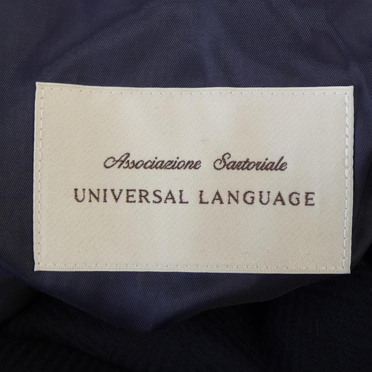 UNIVERSAL LANGUAGE コート