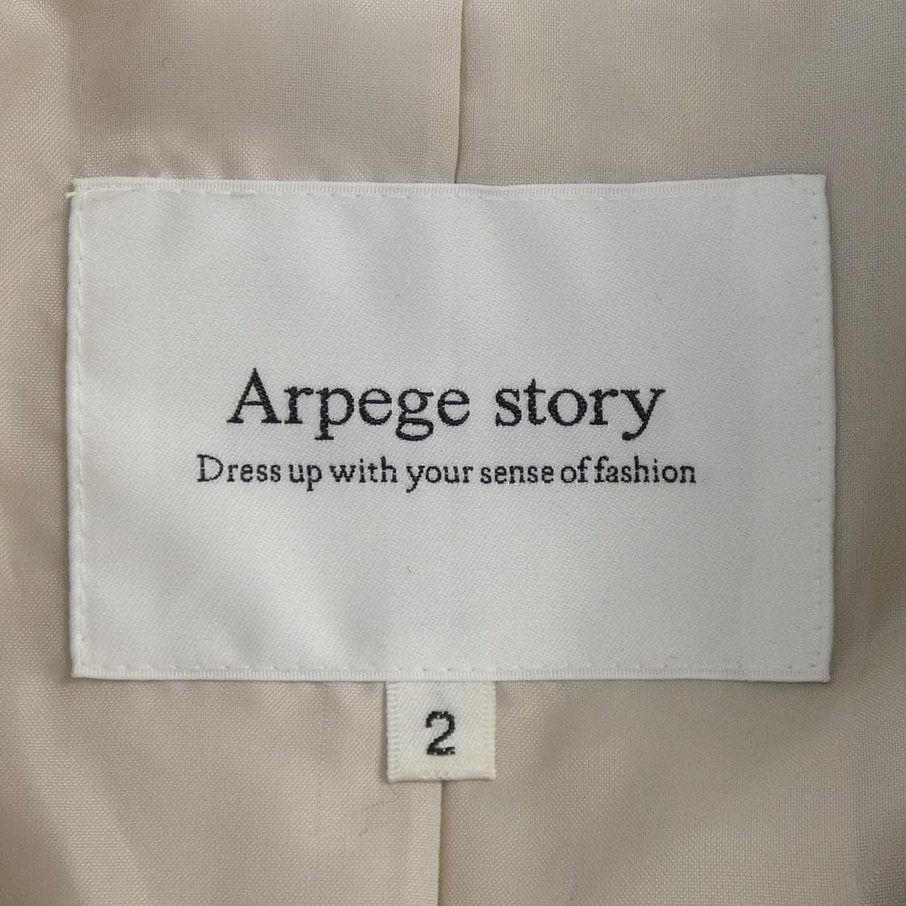 Arpege story trench coat