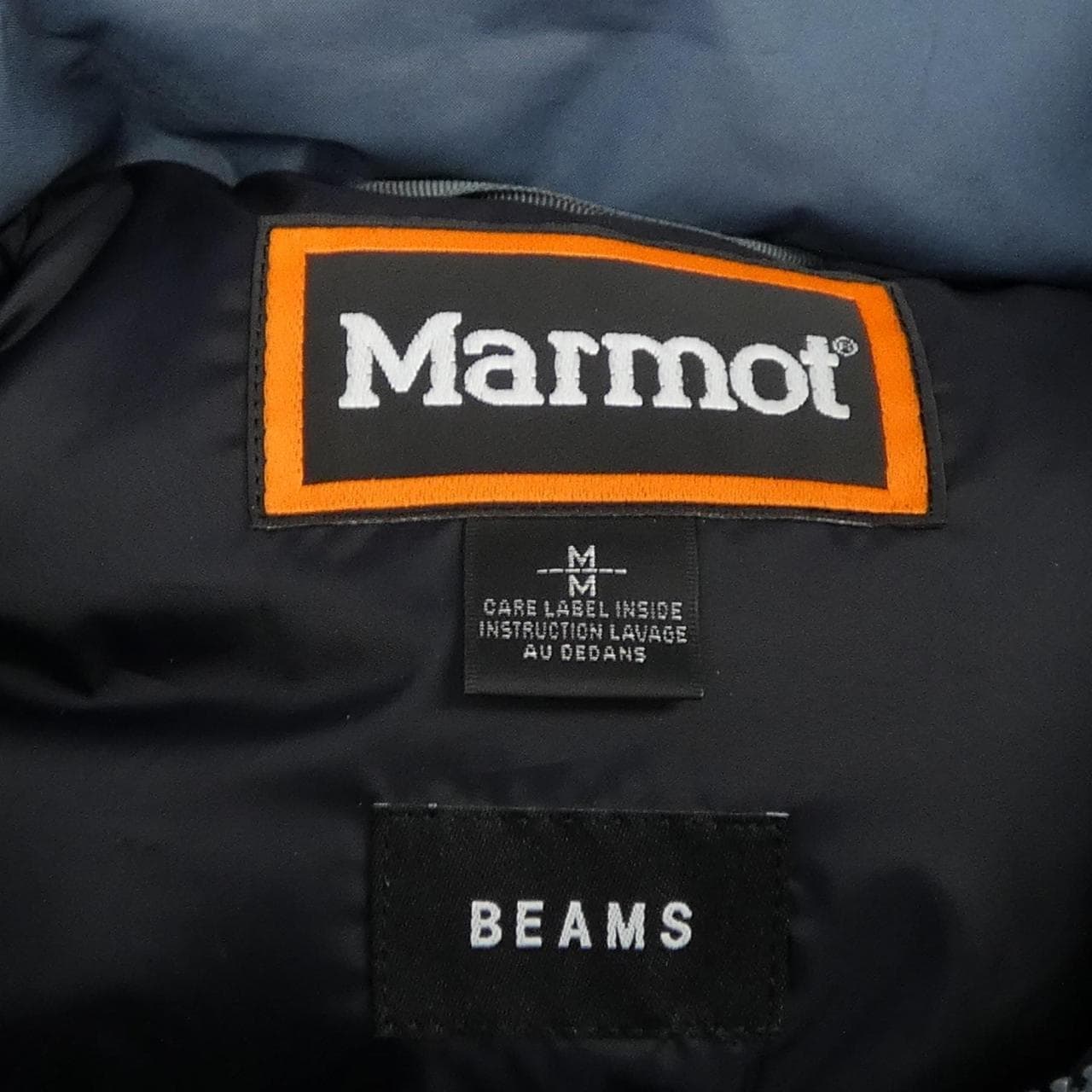 土拨鼠MARMOT TSFMD209BM羽绒服