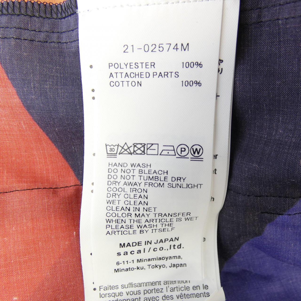 サカイ SACAI KAWS 21-02574M シャツ