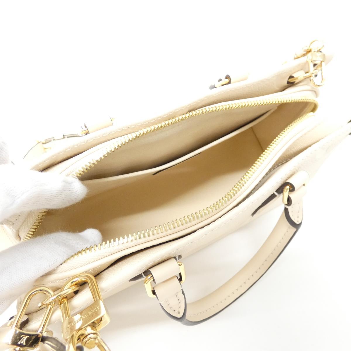 [未使用品] LOUIS VUITTON Monogram Empreinte On The Go EW M23698 包