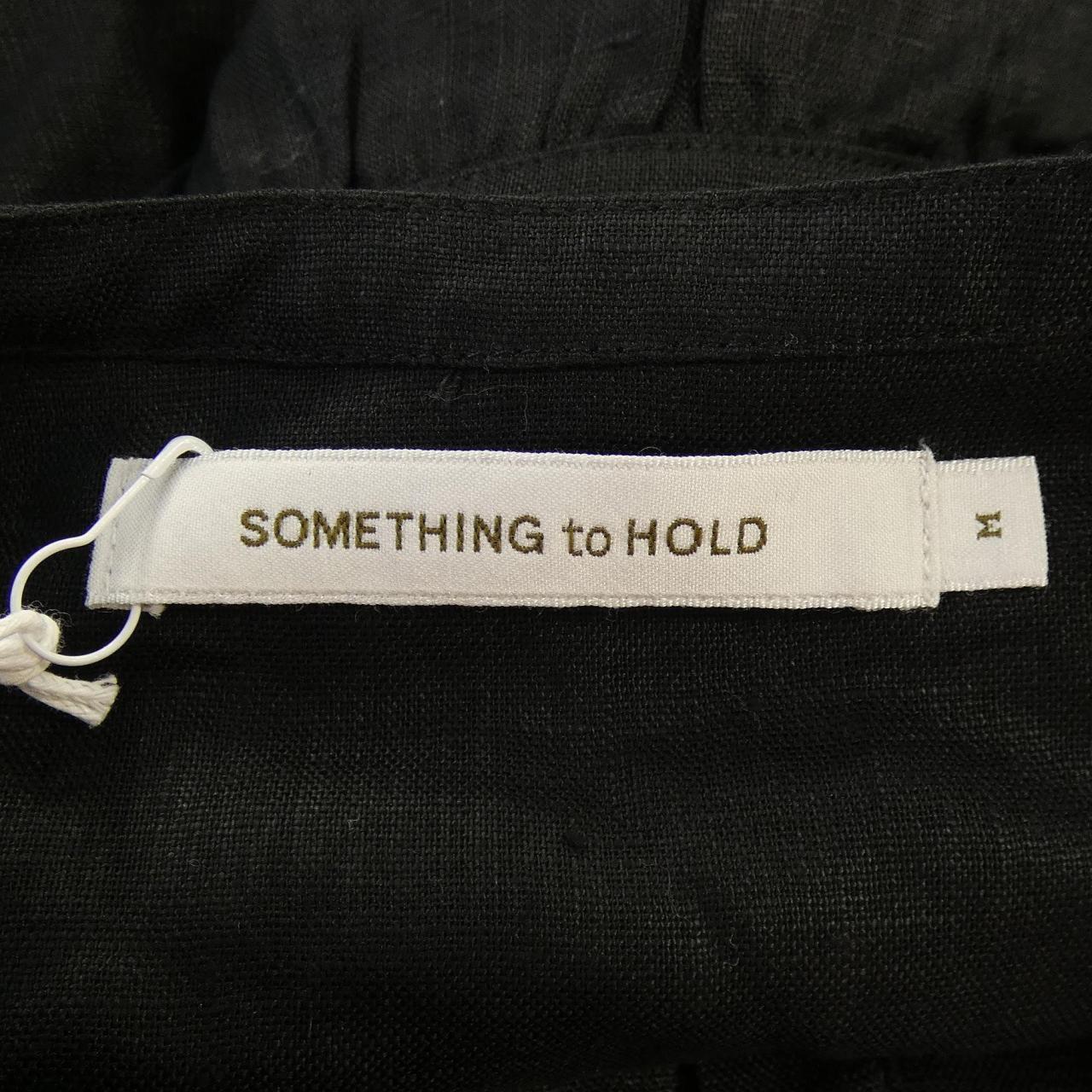 SOMETHING to HOLD トップス