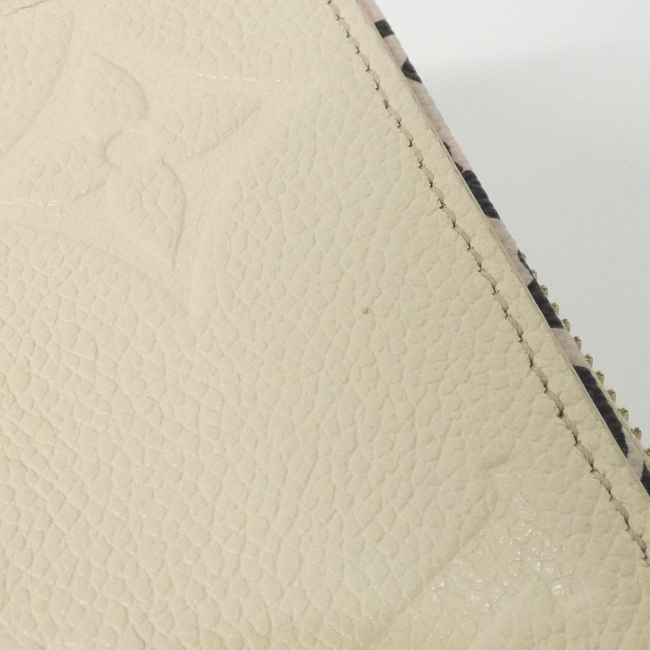 LOUIS VUITTON Monogram Empreinte (Wild at Zippy Wallet M80685)
