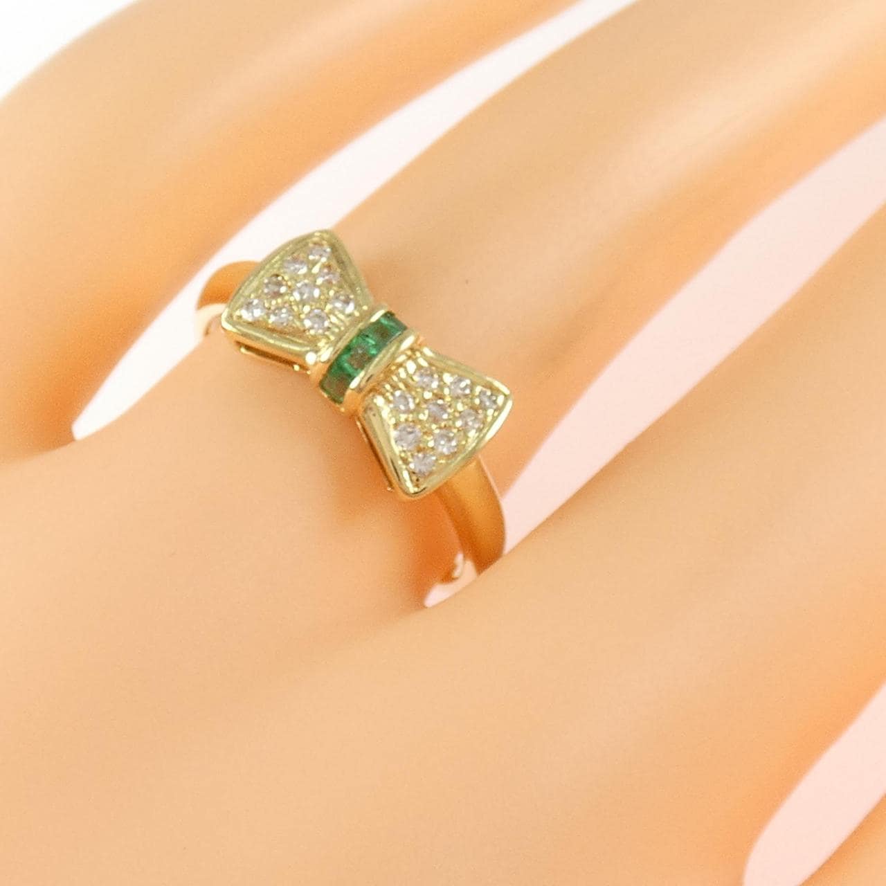 K18YG リボン エメラルド リング 0.10CT