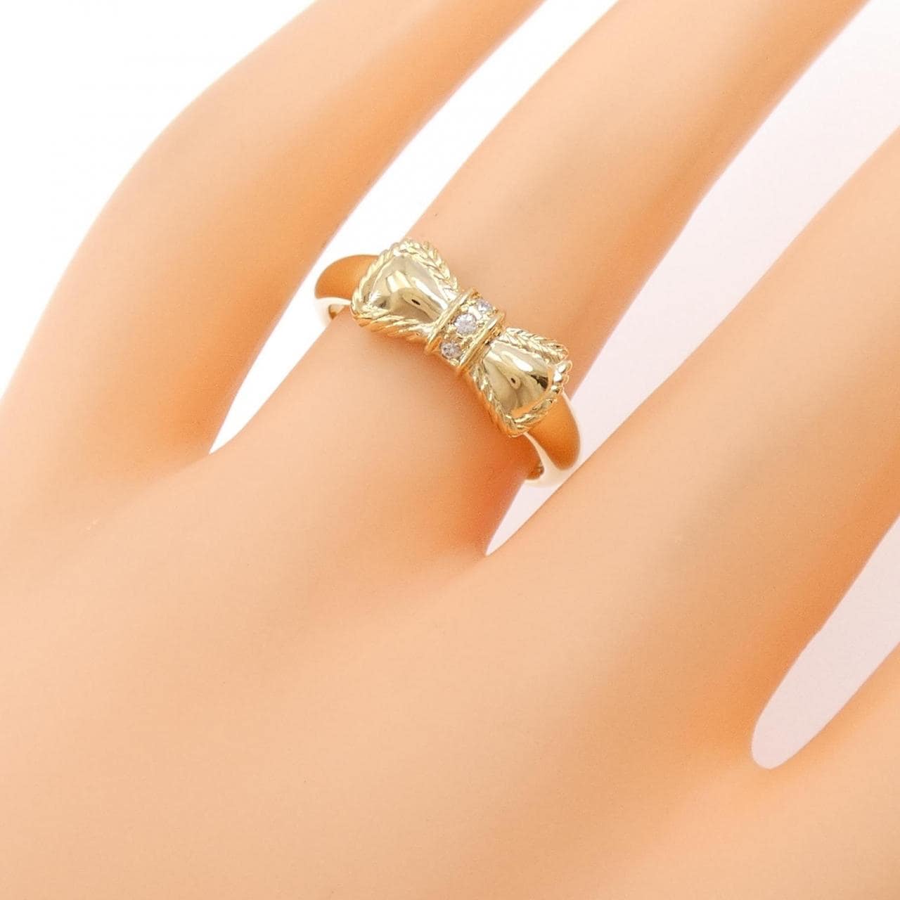 K18YG ribbon Diamond ring