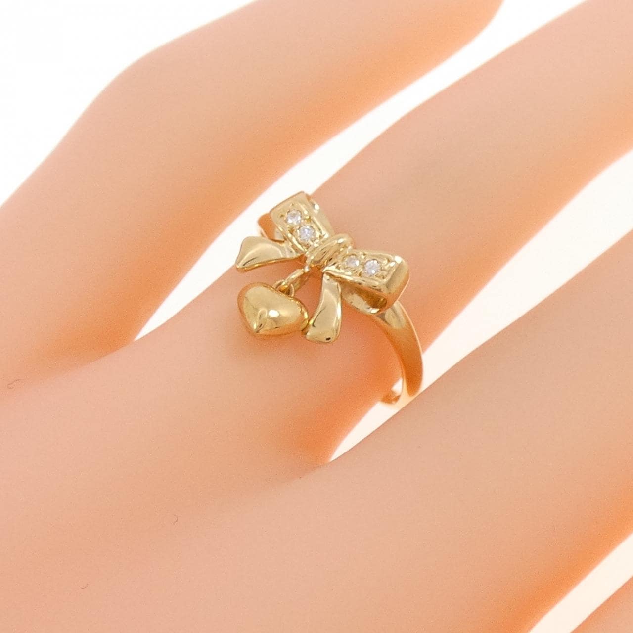 K18YG リボン×ハート ダイヤモンド リング 0.03CT
