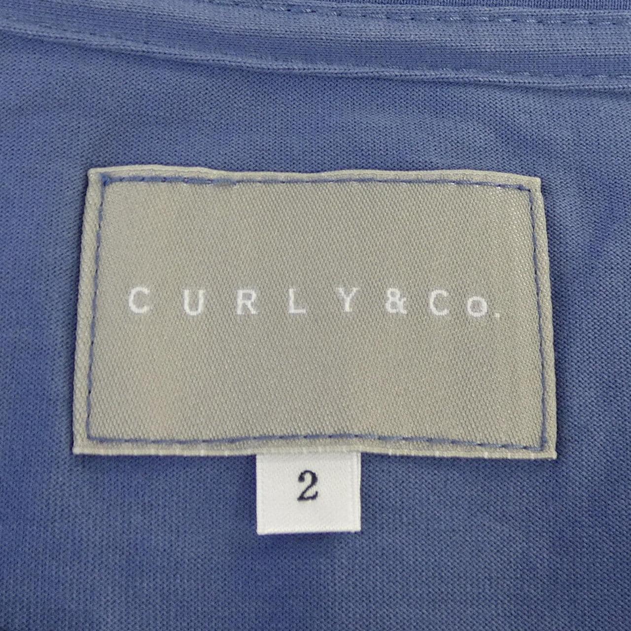 カーリー CURLY&CO Tシャツ