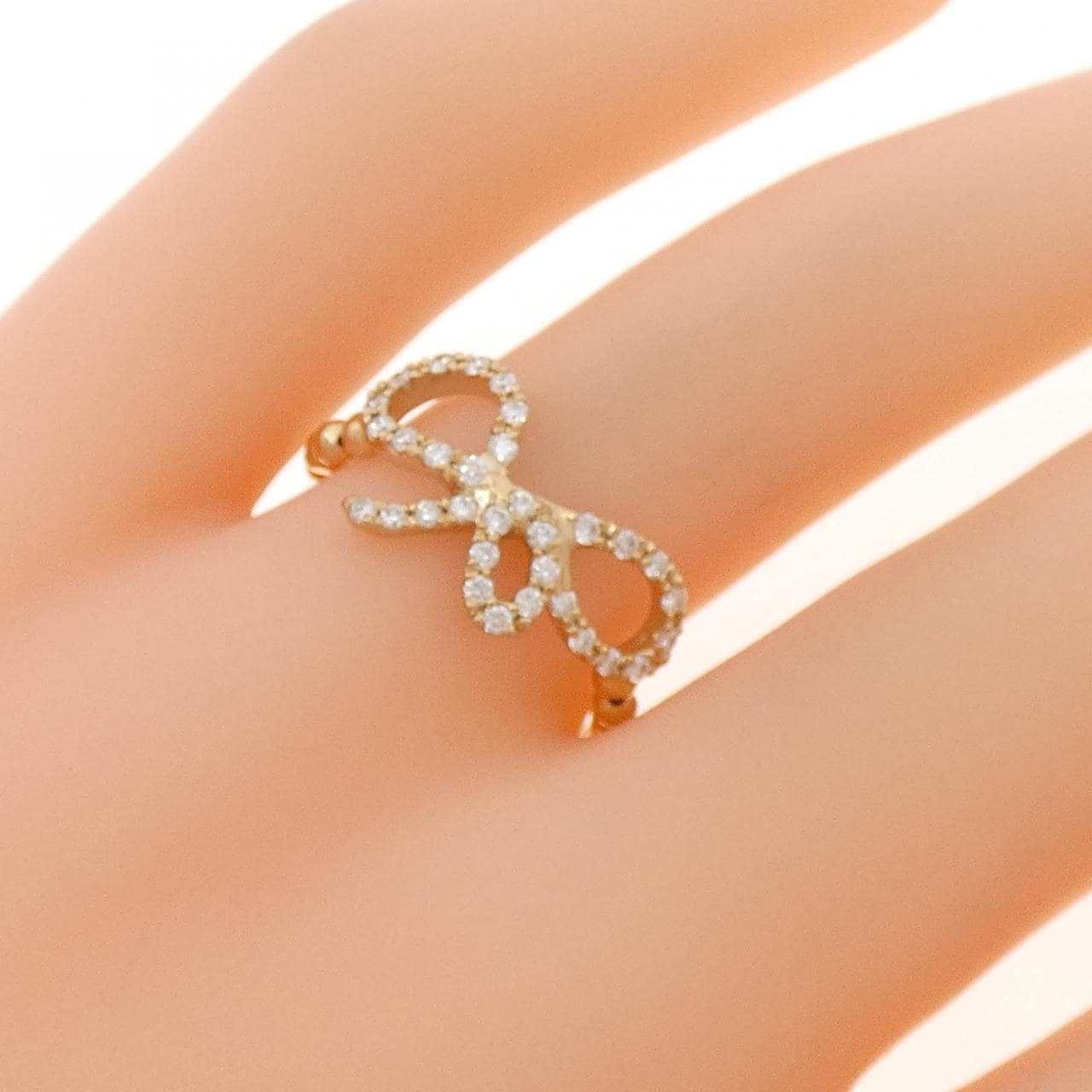 K18PG リボン ダイヤモンド リング 0.19CT
