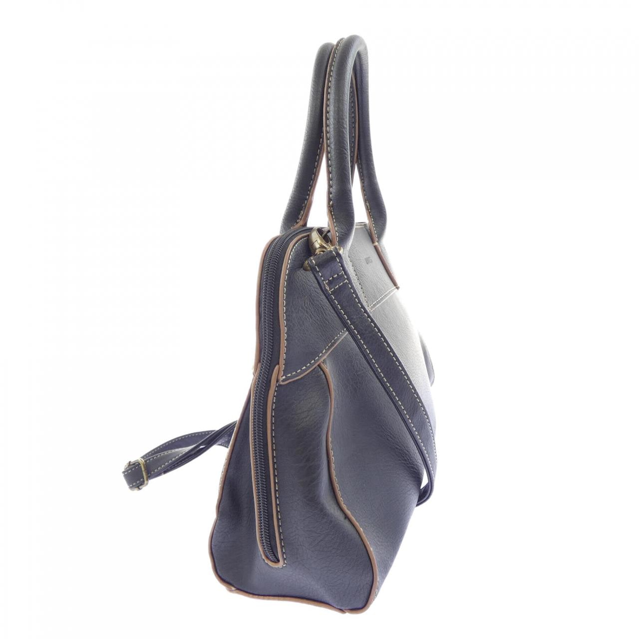 ROOTS BAG