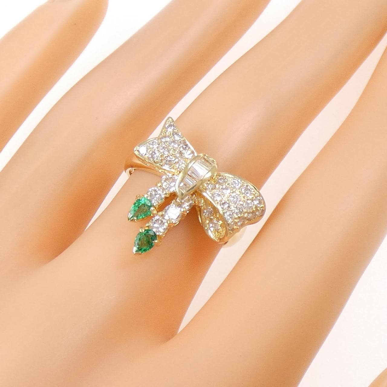 K18YG リボン エメラルド リング 0.25CT