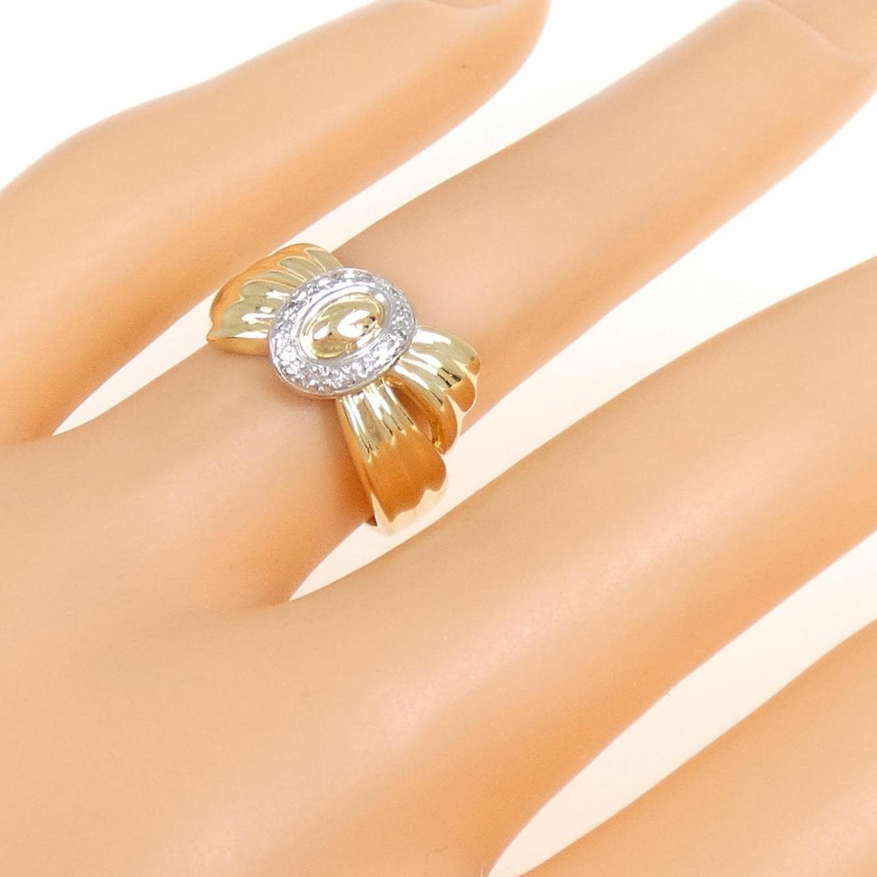 K18YG/PT ダイヤモンド リング 0.06CT