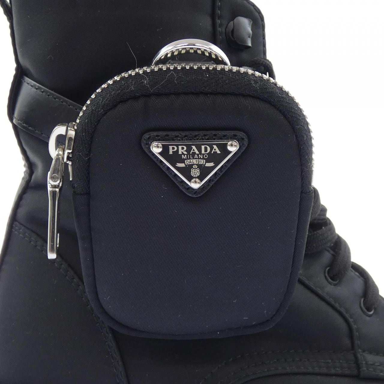 プラダ PRADA モノリス トライアングルロゴ 1T549M ブーツ