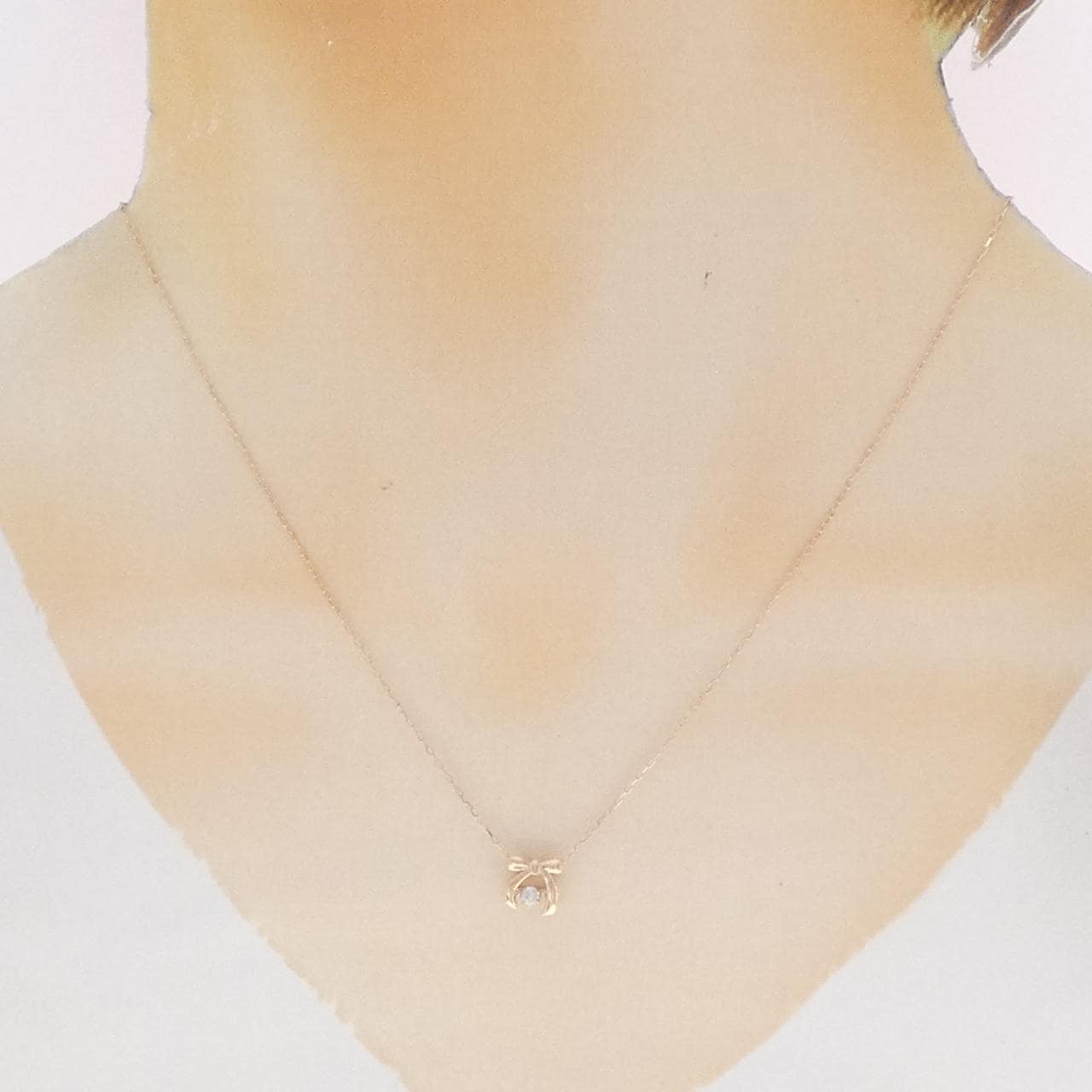 K10PG リボン ダイヤモンド ネックレス 0.05CT