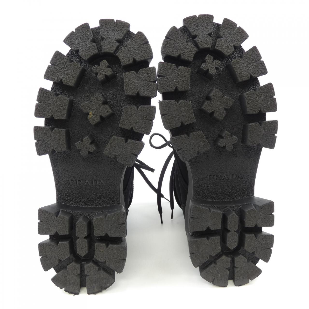 プラダ PRADA モノリス トライアングルロゴ 1T549M ブーツ