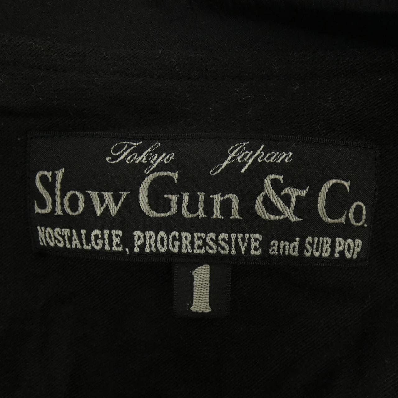 slogan SLOW GUN blouson