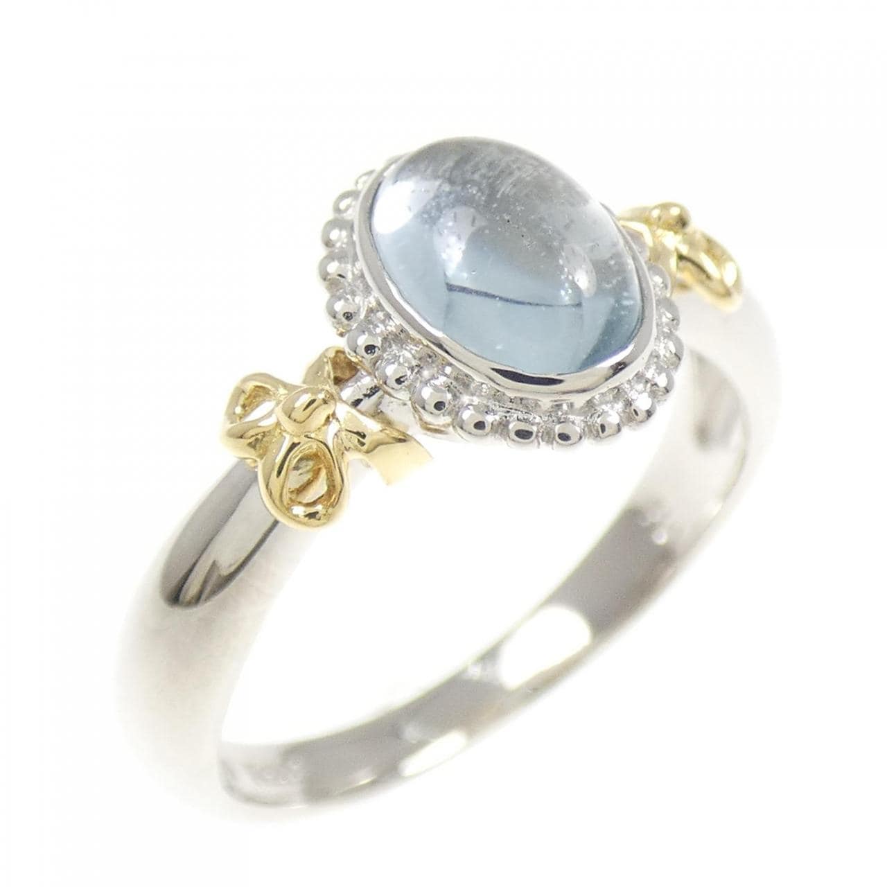 750YG/PT900 リボン ブルートパーズ リング