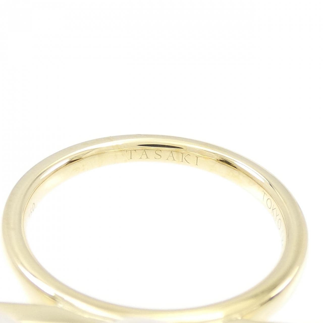 Tasaki balance signature ring