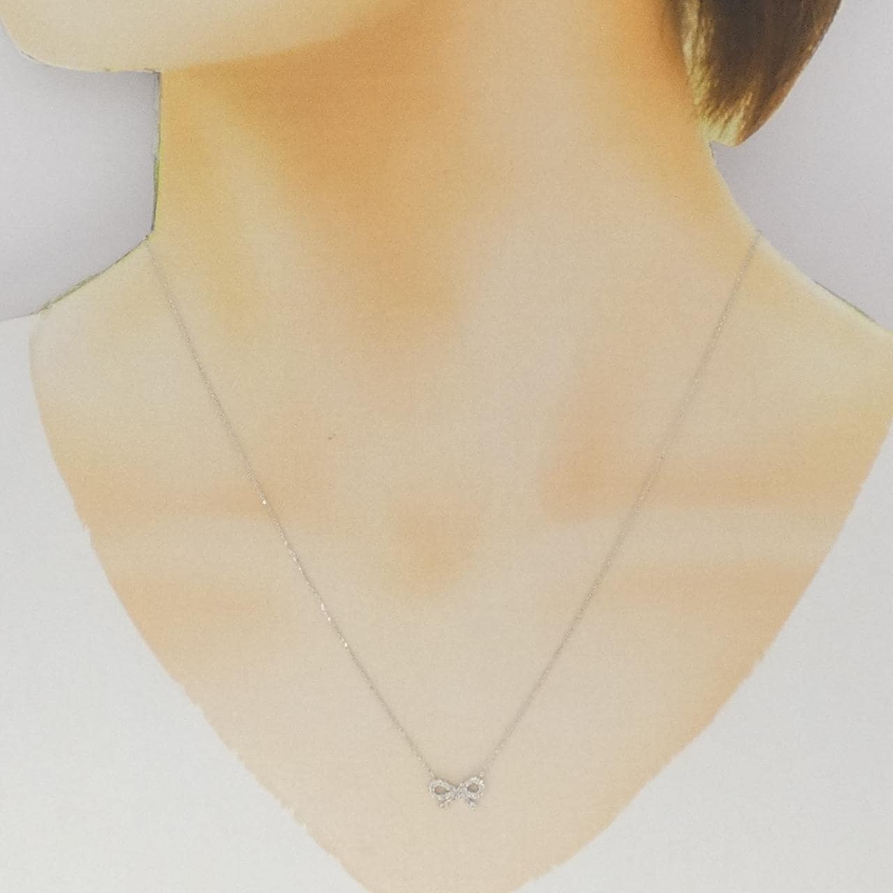 K10WG リボン ダイヤモンド ネックレス 0.12CT