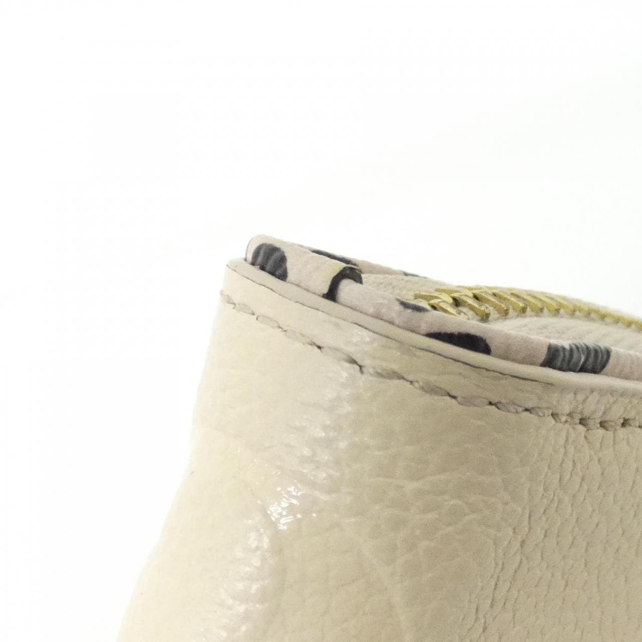 LOUIS VUITTON Monogram Empreinte (Wild at Zippy Wallet M80685)