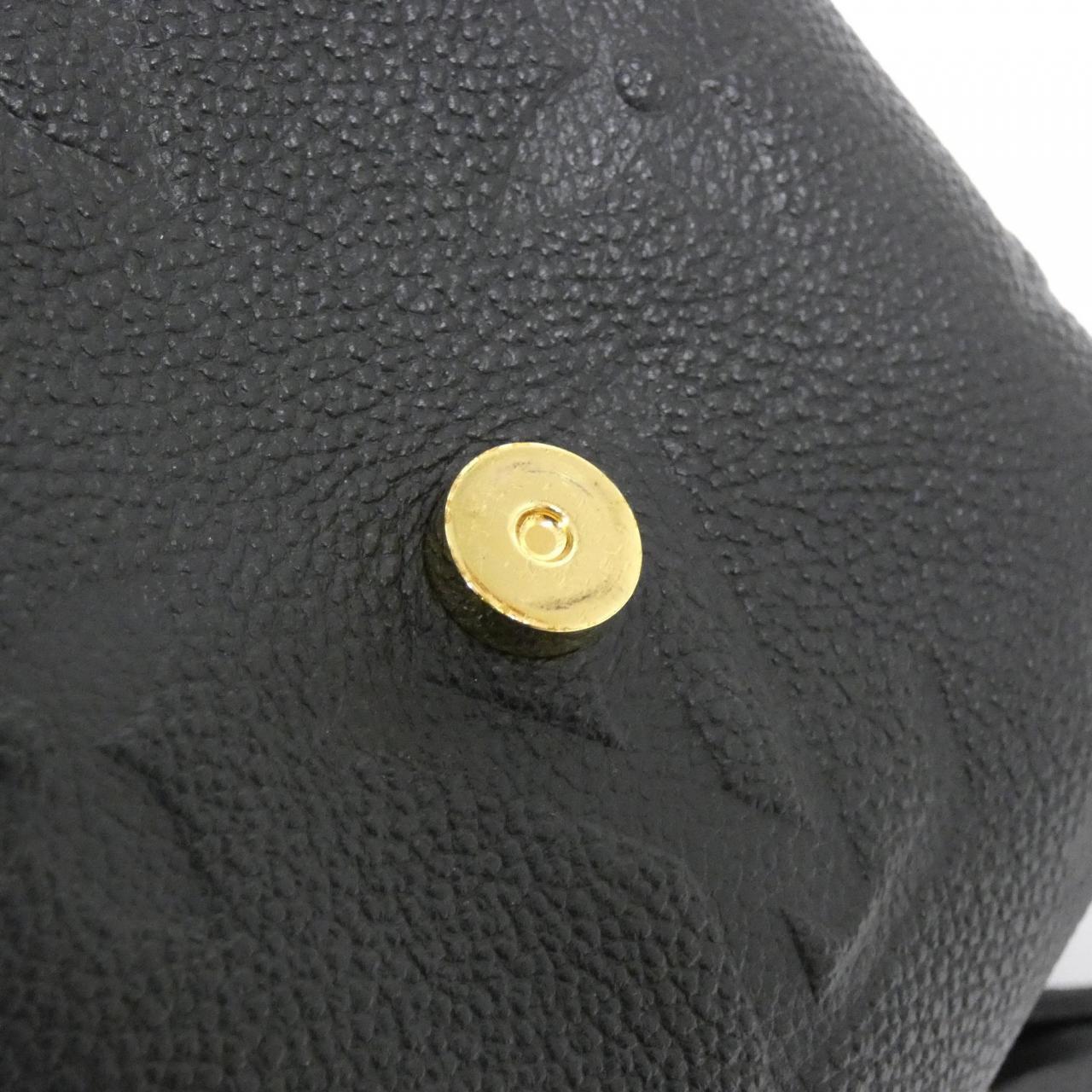 LOUIS VUITTON Monogram Empreinte Tiny Backpack M80596 Rucksack