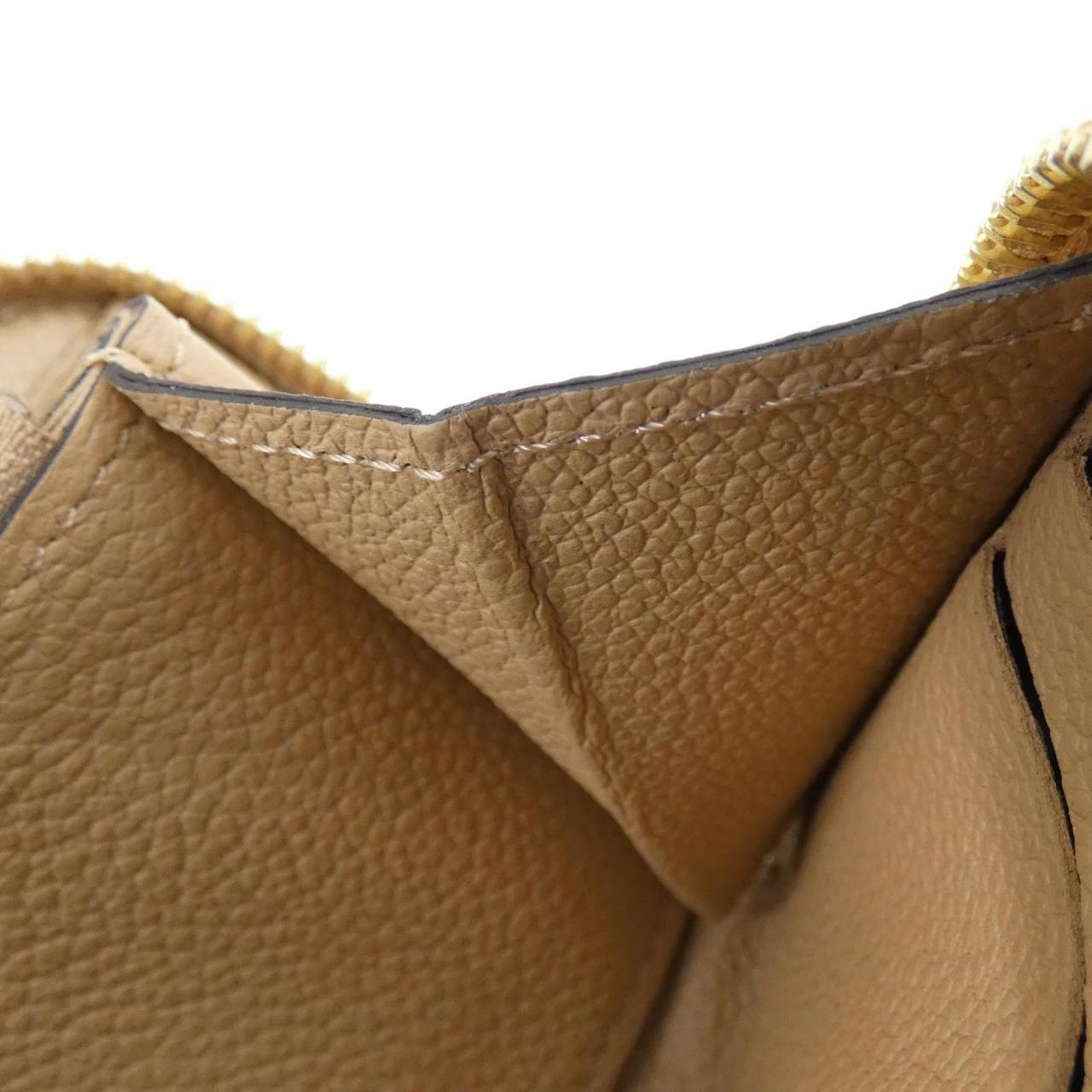 LOUIS VUITTON Monogram Empreinte Clemence M60173 Wallet