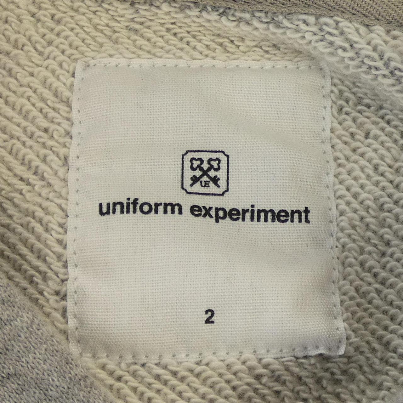 ユニフォームエクスペリメント UNIFORM EXPERIMENT UE-192111 パーカー