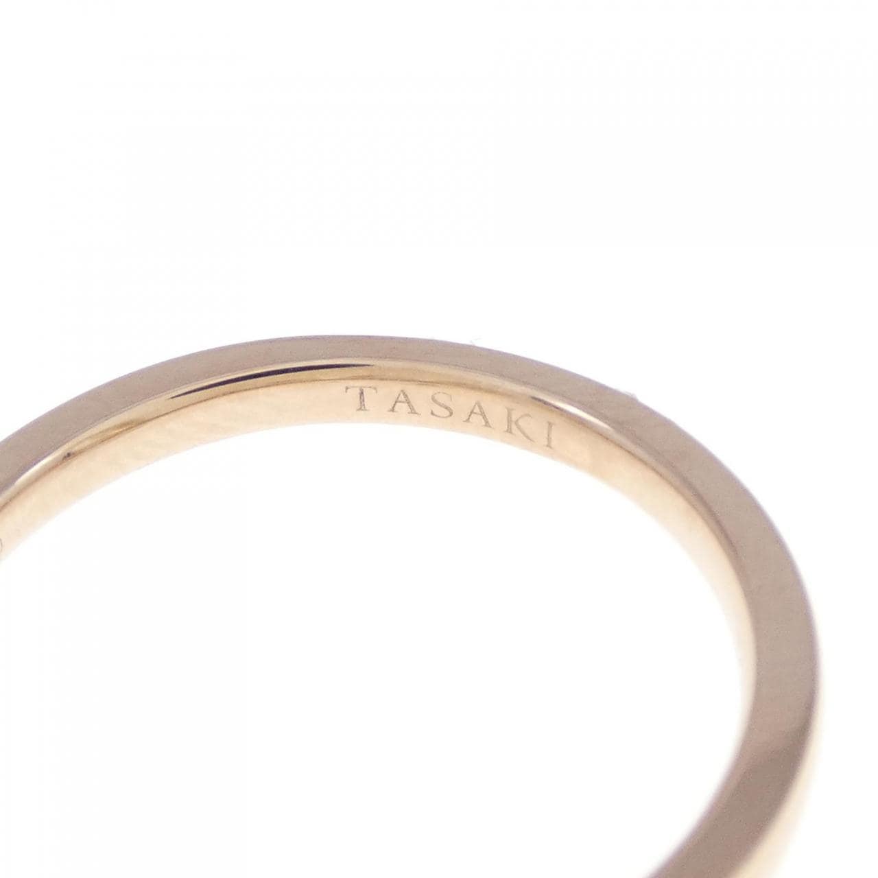 Tasaki balance signature ring