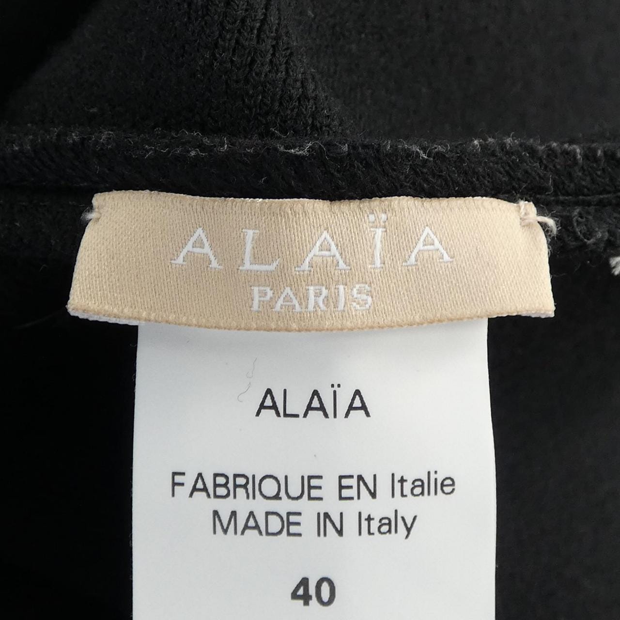 アライア ALAIA AA9S0094RM643 ニット