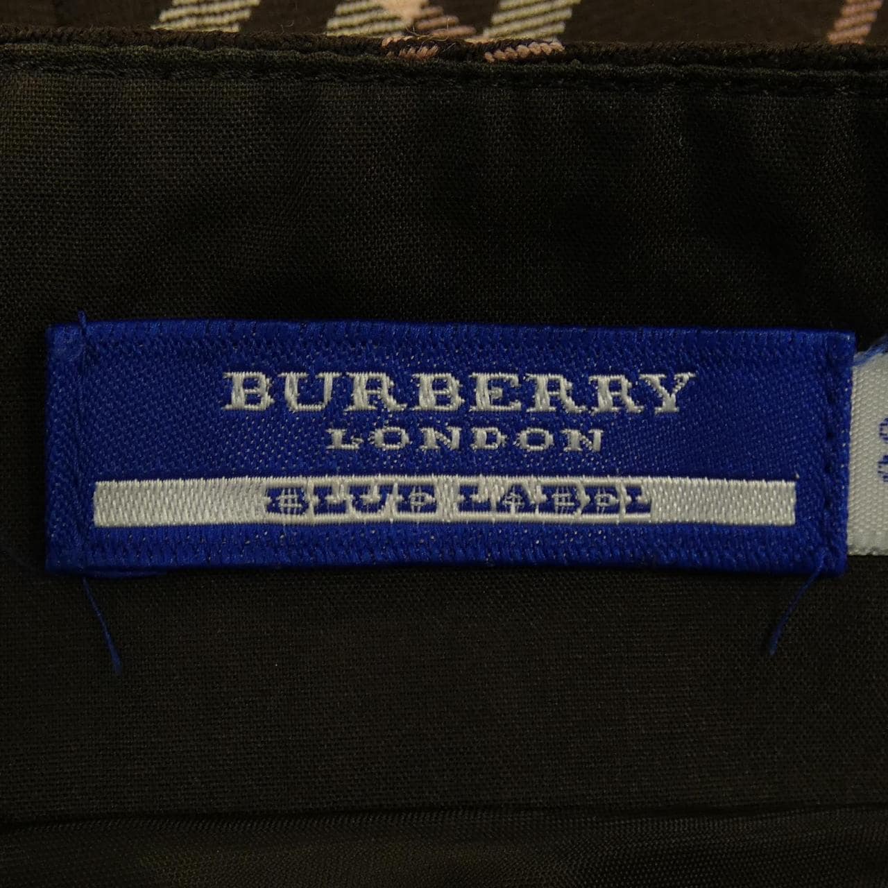 Burberry label on sale