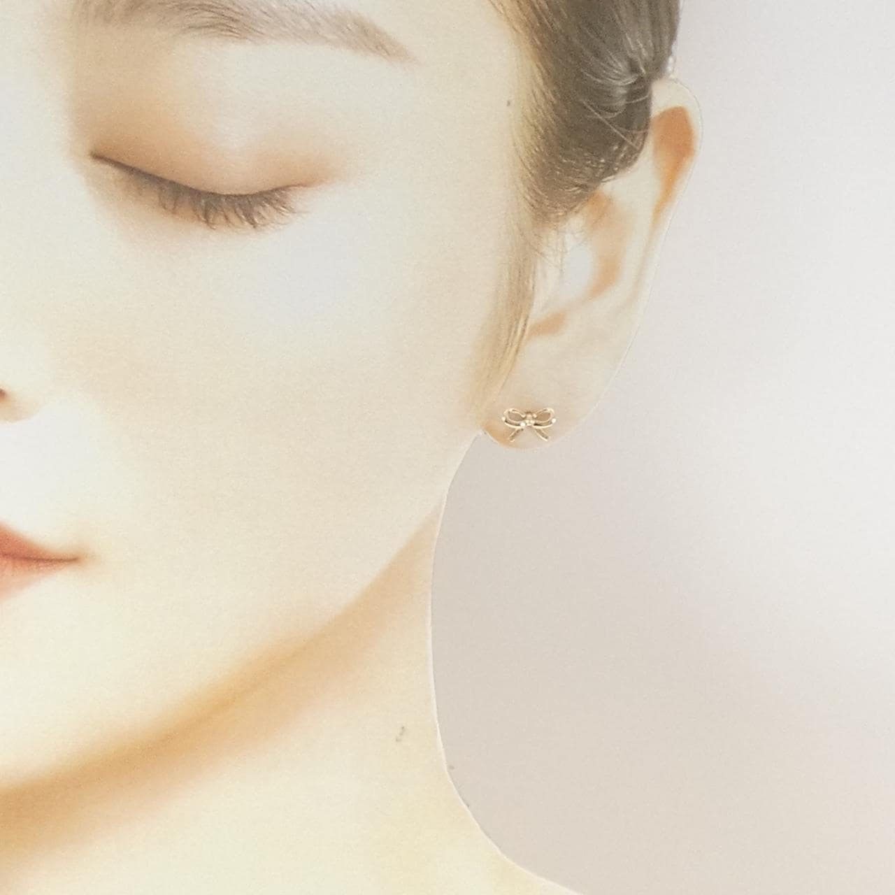 K10PG リボン ピアス