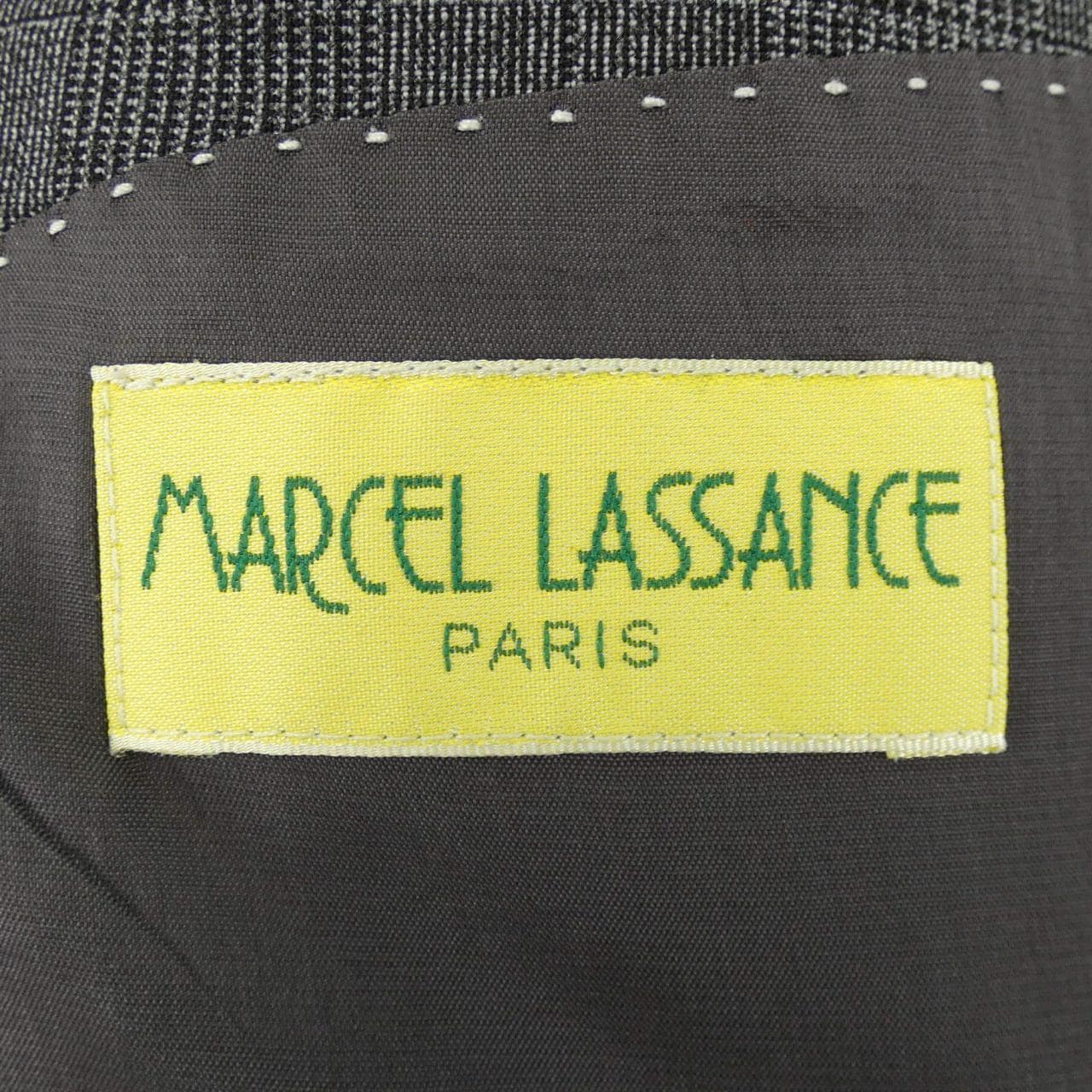 Marcel Lassance suit