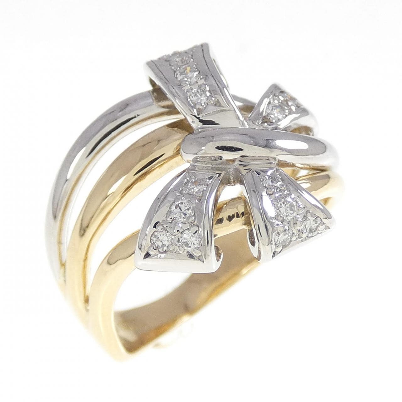 K18YG/PT900 リボン ダイヤモンド リング 0.19CT
