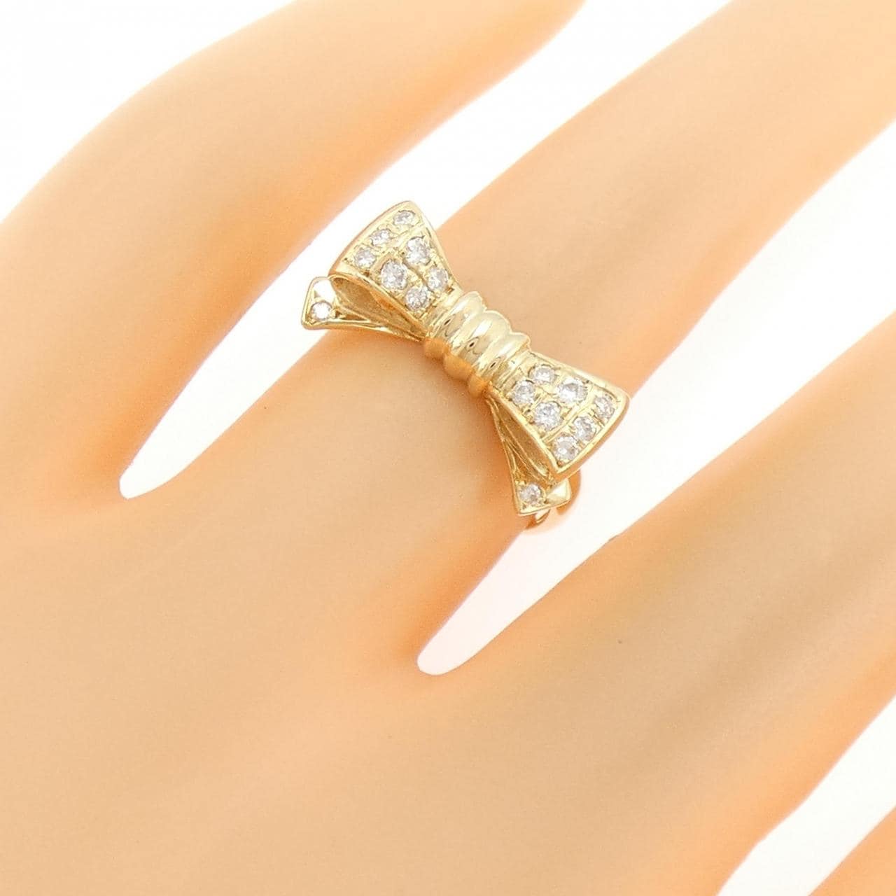 K18YG リボン ダイヤモンド リング 0.18CT